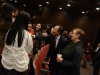 Consul General Hong Lei shakes hands with students