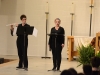Melissa Krause and Catherine Verrilli perform at the front of the church