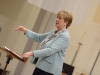 Mary Jo Bot directs the choir