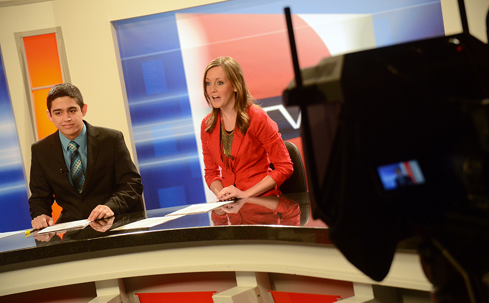UTVS News anchors Emilio Ramos DeJesus. Princeton, and Julia Allen, Big Lake. Photo by Adam Hammer '05
