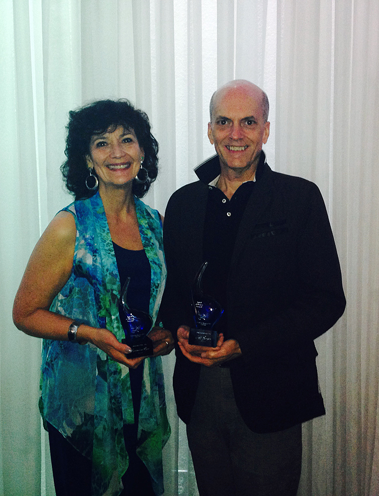 Jeff Ringer and Roseanna Ross display the awards they earned at the Minneapolis Conflict Resolution Center’s Volunteers Dinner. 