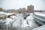 Atwood Memorial Center and the Performing Arts Center are seen covered in snow.
