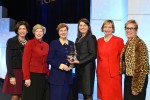 Lisa Foss, center right, holds the ACE mentor award
