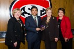 Ashish Vaidya holds the award with Dee Rengel, Kim Orn and Corie Beckermann also pictured