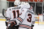Brothers Ryan Poehling and Jack Poehling clebratea goal against Alaska Fairbanks.