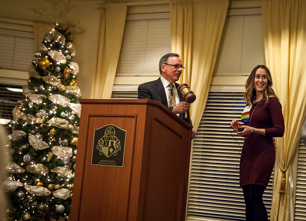 The departing 2017 MSCA President, Rick Plessner, hands down the gavel to incoming president Jesseka Doherty. Photo by Mid-America Real Estate – Minnesota
