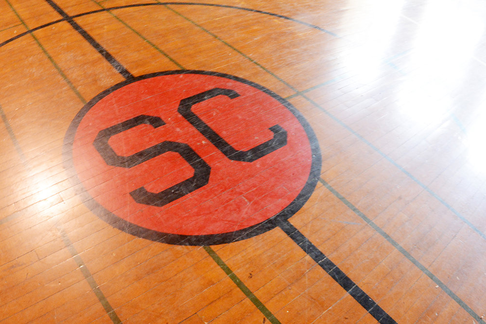 The SC logo in the Eastman Hall gym floor