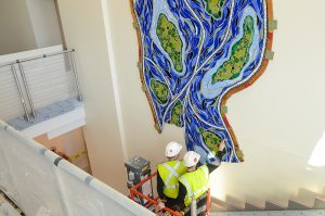 Can-do alumna artist delivers Mississippi River mosaic