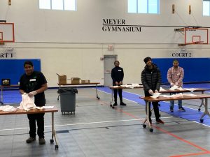 Students help pack lunches at Boys & Girls Club