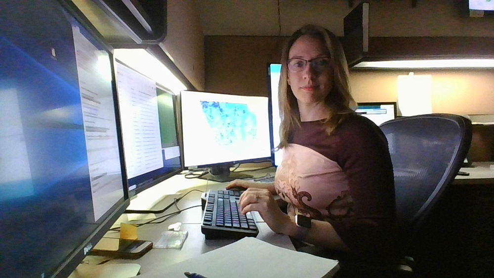 Dr. Andrea Thorstensen at her River Forecasting Center desk