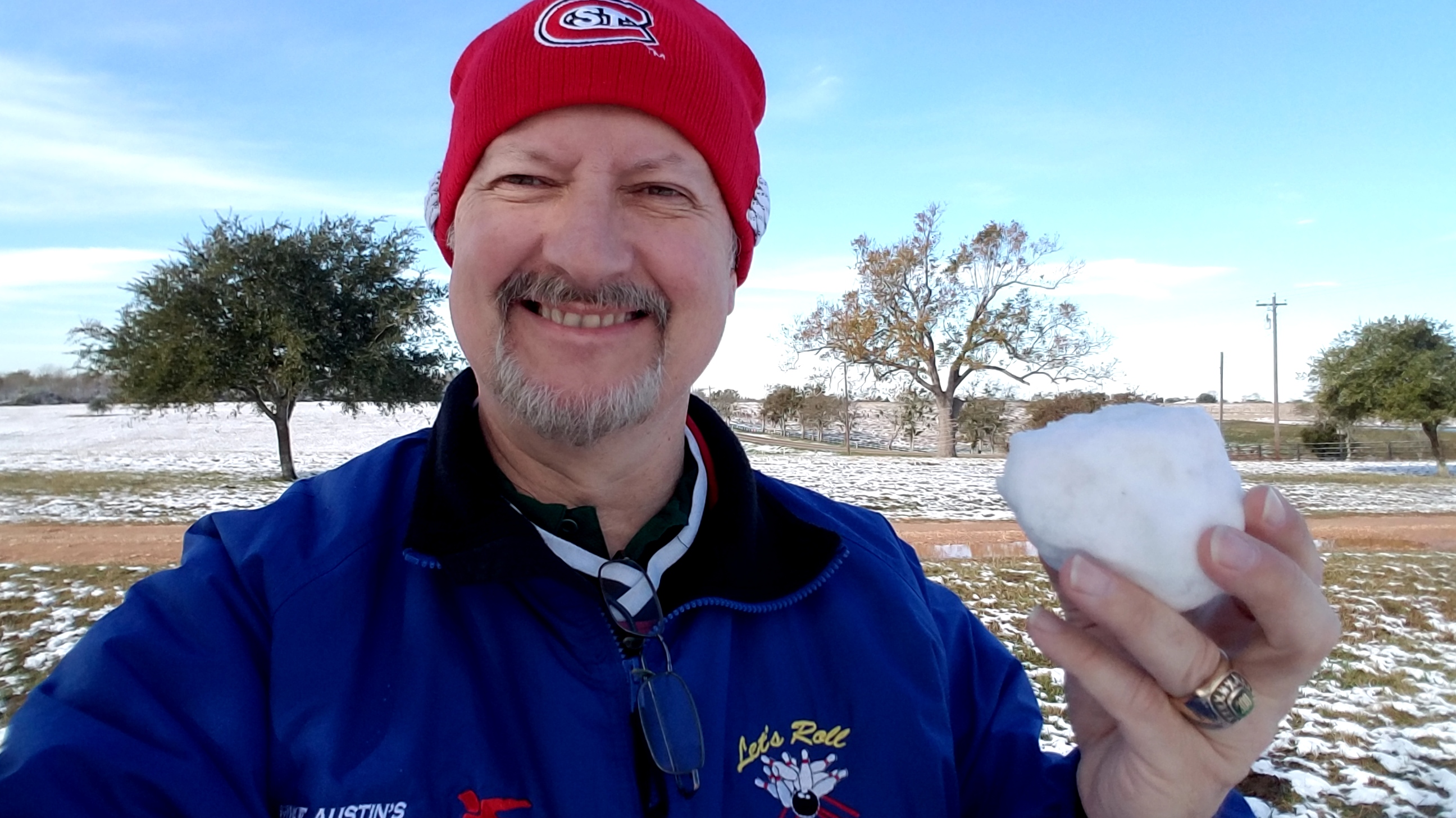 Mark London holding a snowball