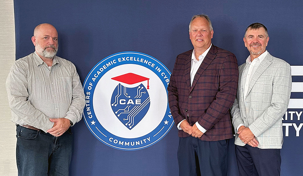 Brian Volkmuth, SCTCC, Phil Thorson and Mark Schmidt SCSU. At the Executive Leadership Forum in St. Louis.