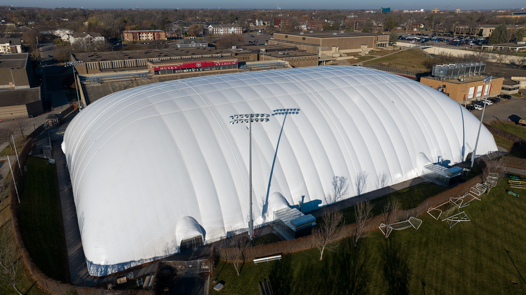 An aerial view of a white dome with the SCSU campus and city of St. Cloud visible in the background