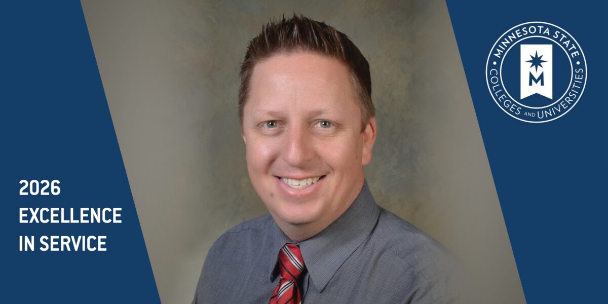 Matt Trombley, wearing a dress shirt and red tie, smiles for a headshot with the words 2026 excellence in service and the Minnesota State Colleges and Universities logo each visible on the side