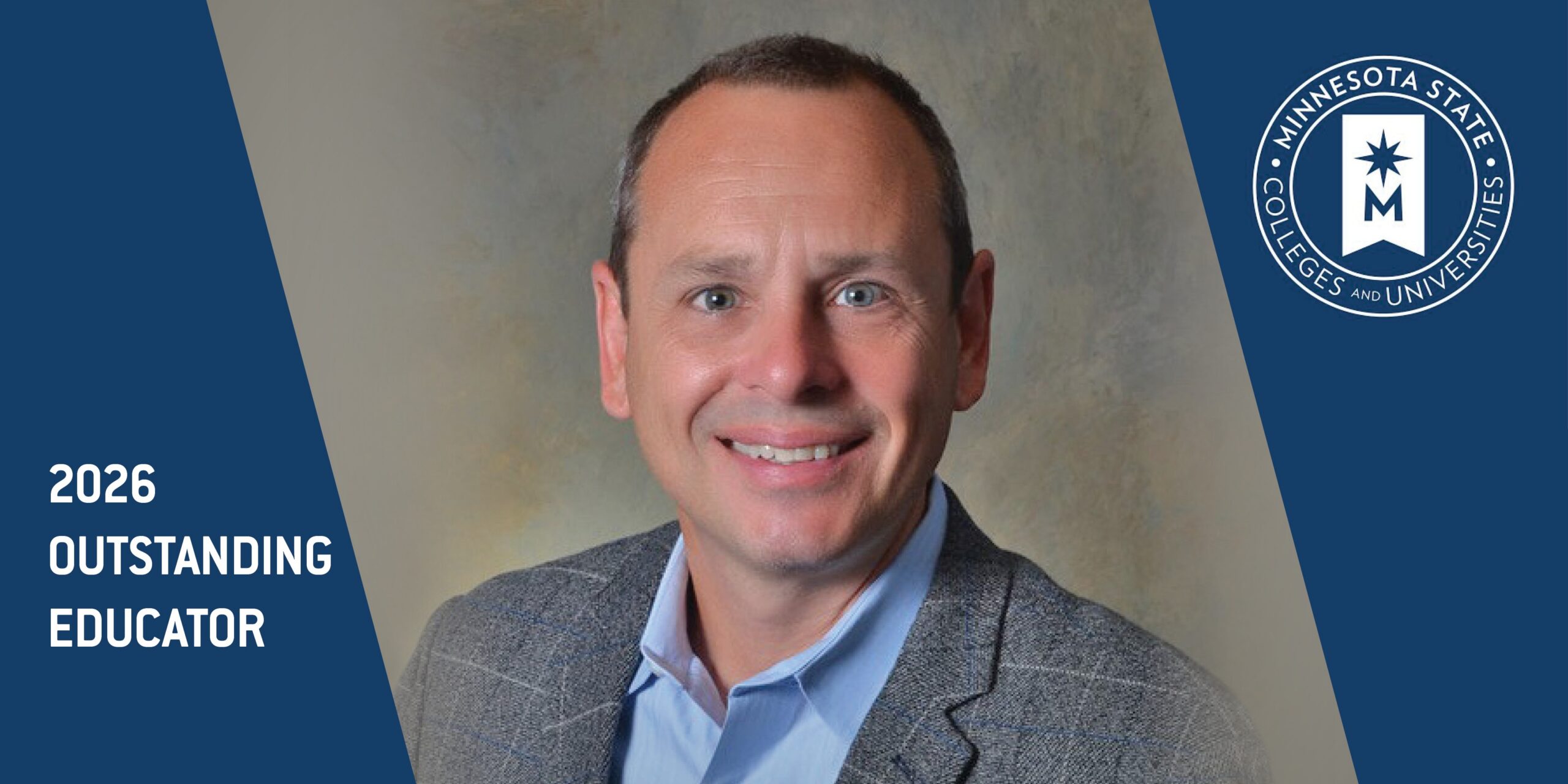 Emil Towner, wearing a blue shirt and grey blazer, smiles for a headshot with the words 2026 outstanding educator and the Minnesota State Colleges and University logo present in blue on the sides