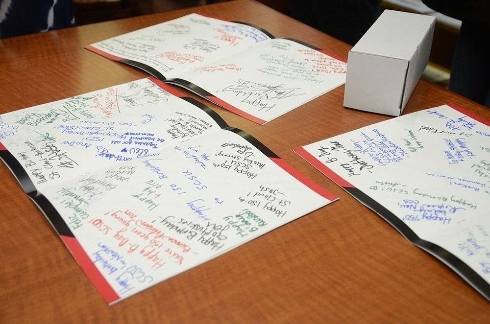 Signed birthday cards on a table
